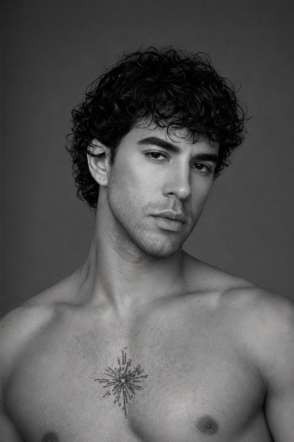 Black-and-white portrait of Luis Corrales